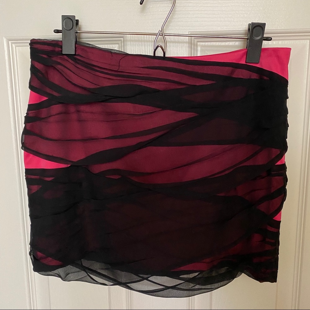 Bebe black + neon pink miniskirt